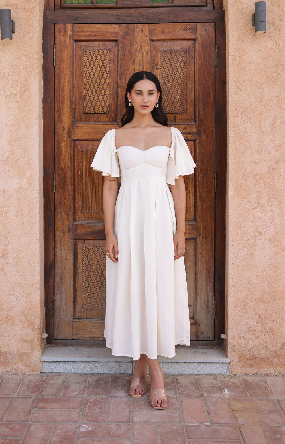 The Seraphina Dress by Thr3letter, a linen and viscose blend in a beautiful ivory tone.