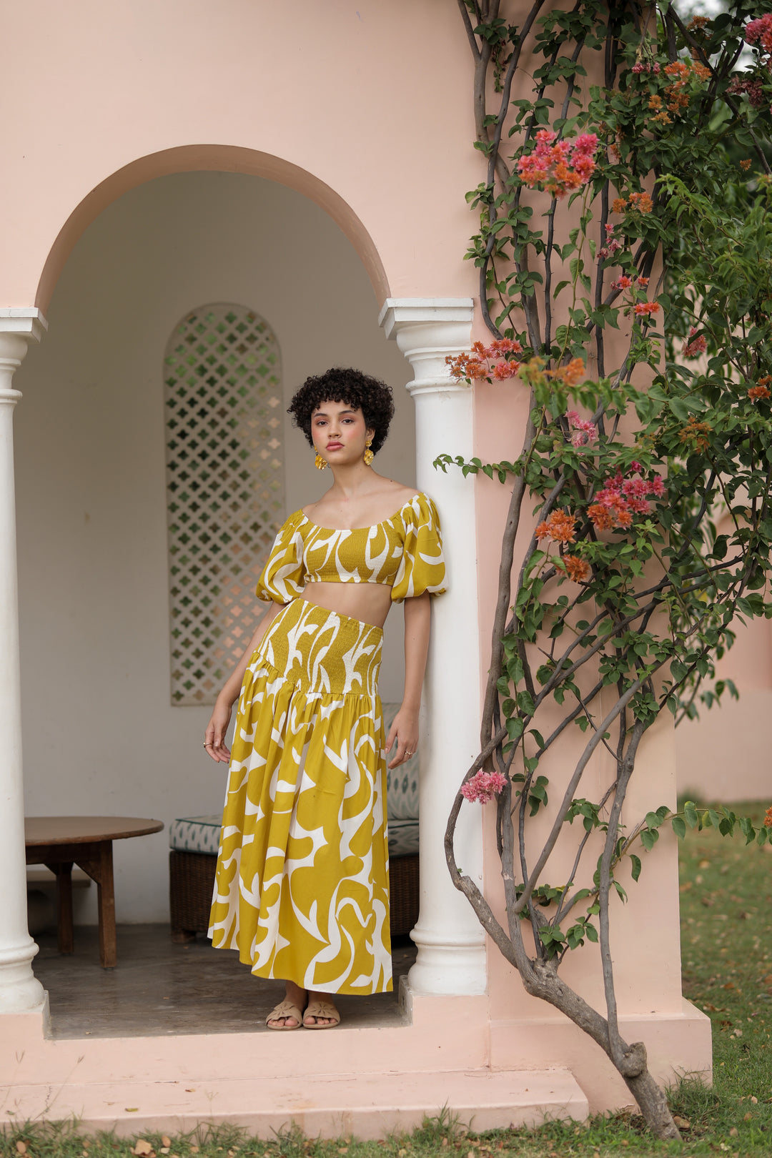 thr3letter veronica skirt in bold mustard yellow with abstract white print, styled as a matching set
