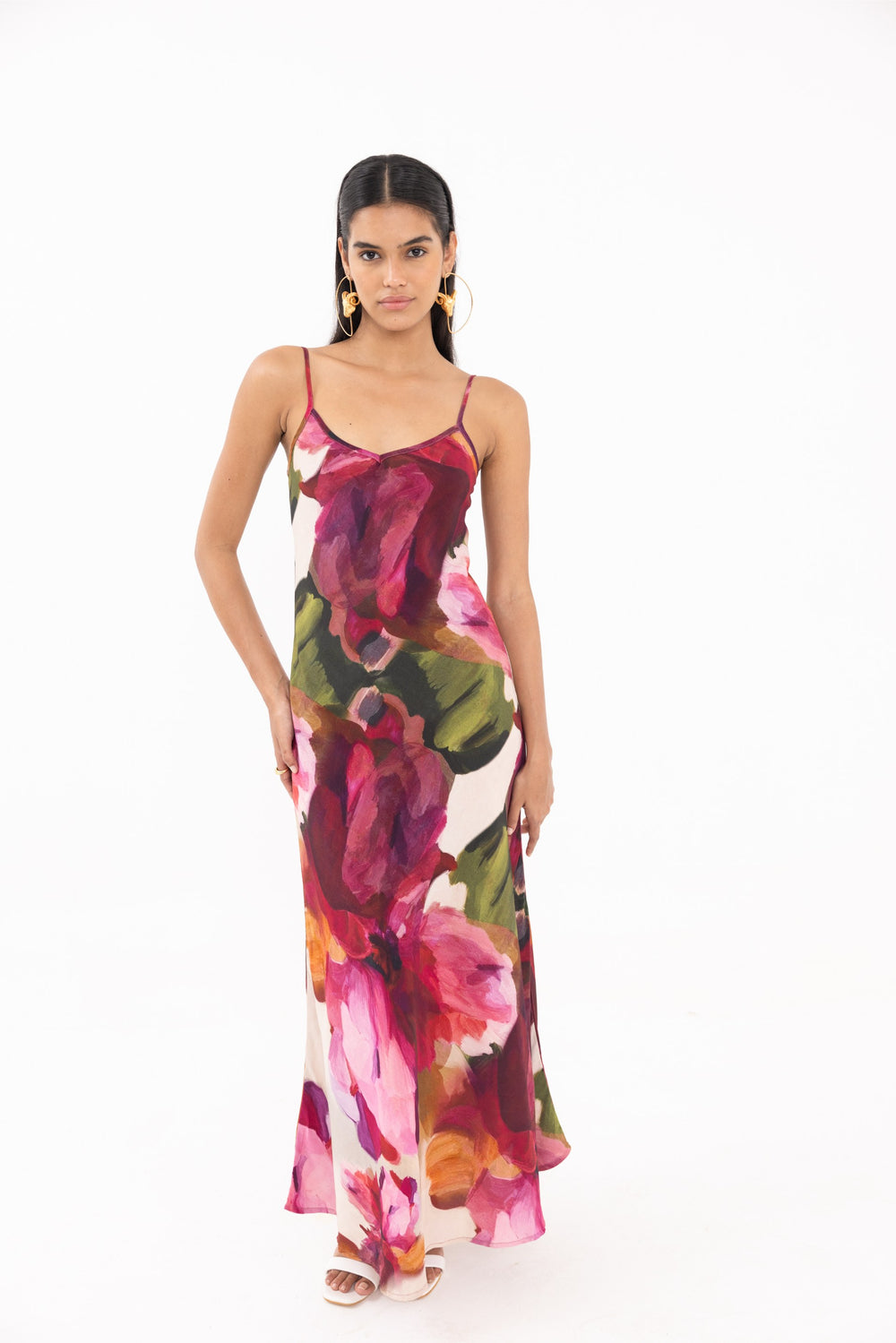 Thr3letter Zahra Satin Floral Print Slip Dress - A long, sleeveless dress with a satin finish and a bold, painterly floral design in warm, earthy tones.