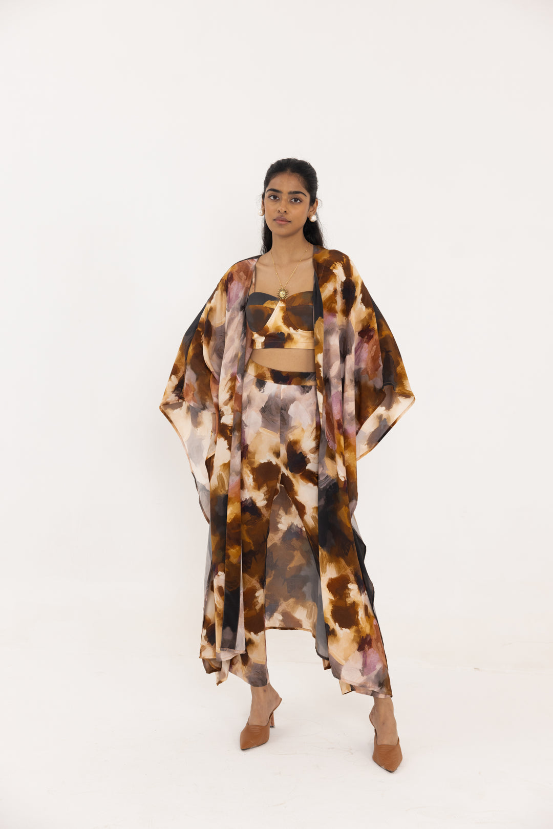 Thr3letter's premium crepe kaftan featuring dramatic watercolor print in sophisticated brown and golden hues