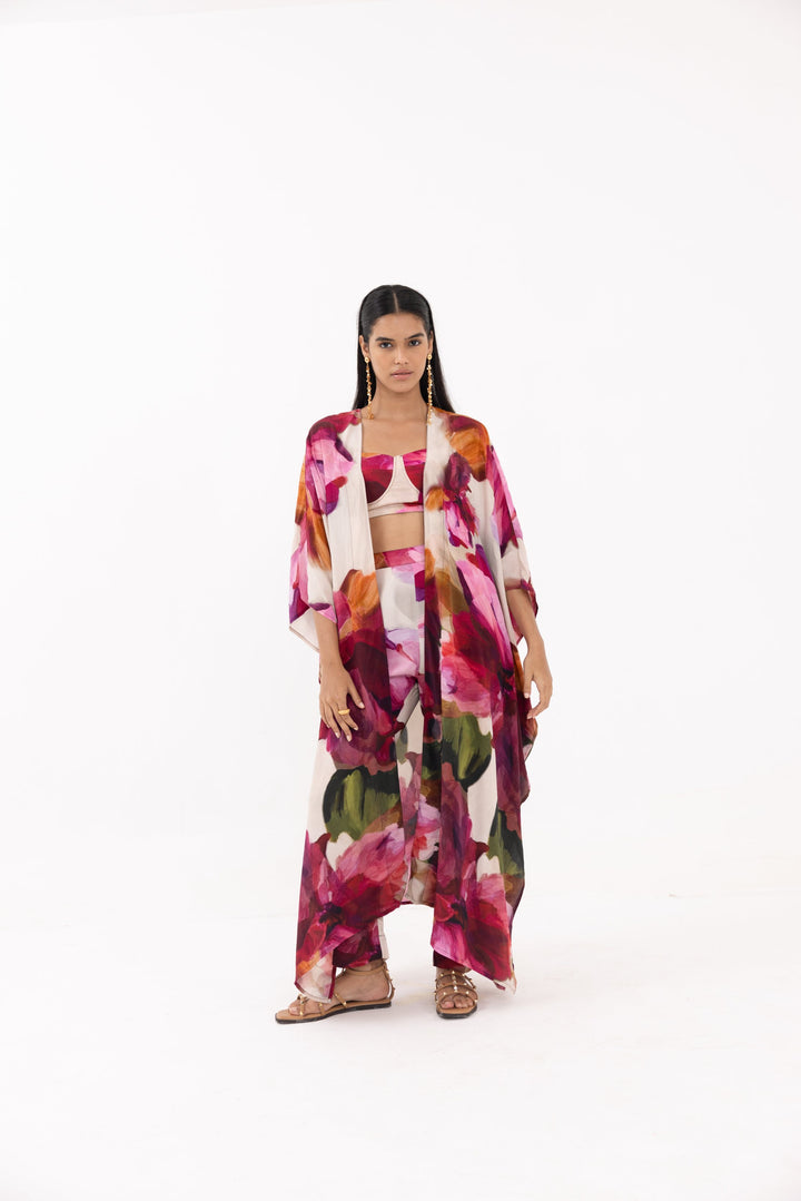 Designer dresses for women: Thr3letter statement kaftan featuring artistic pink florals on flowing crepe
