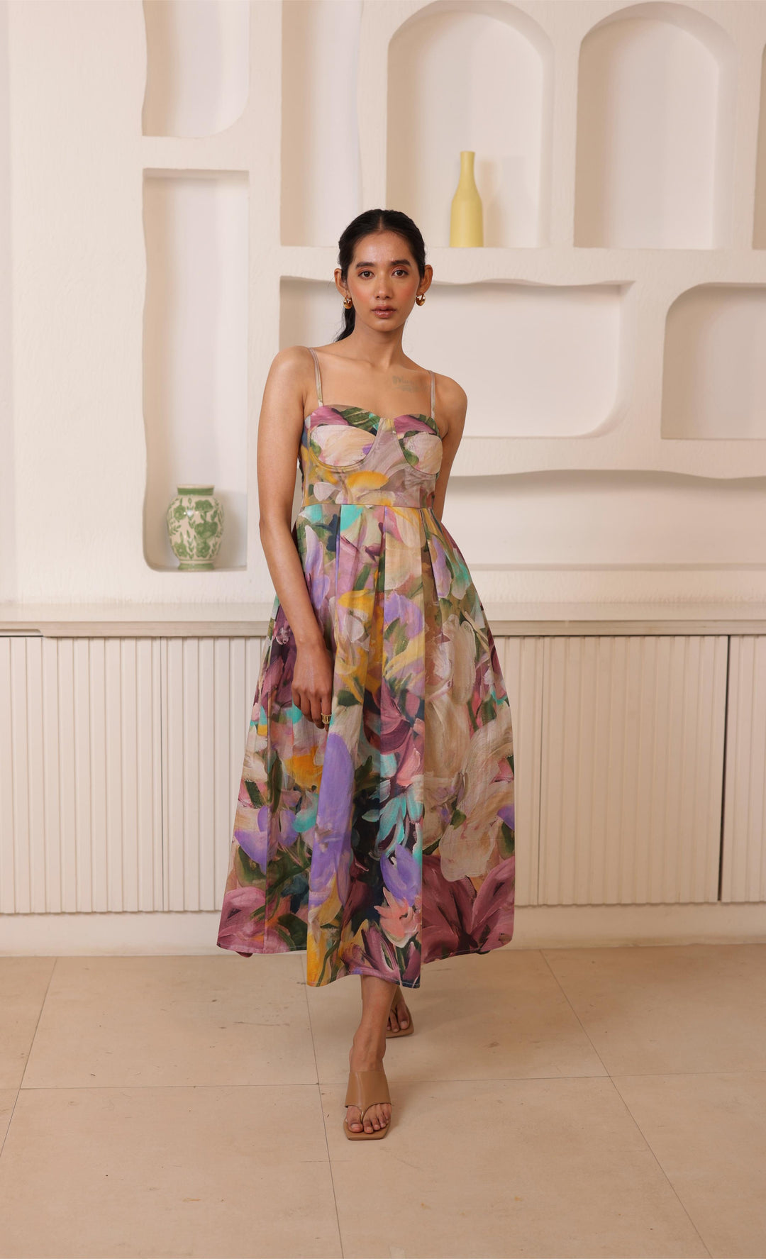 Elegant Nissar padded dress from thr3letter in multi-colored abstract floral with spaghetti straps