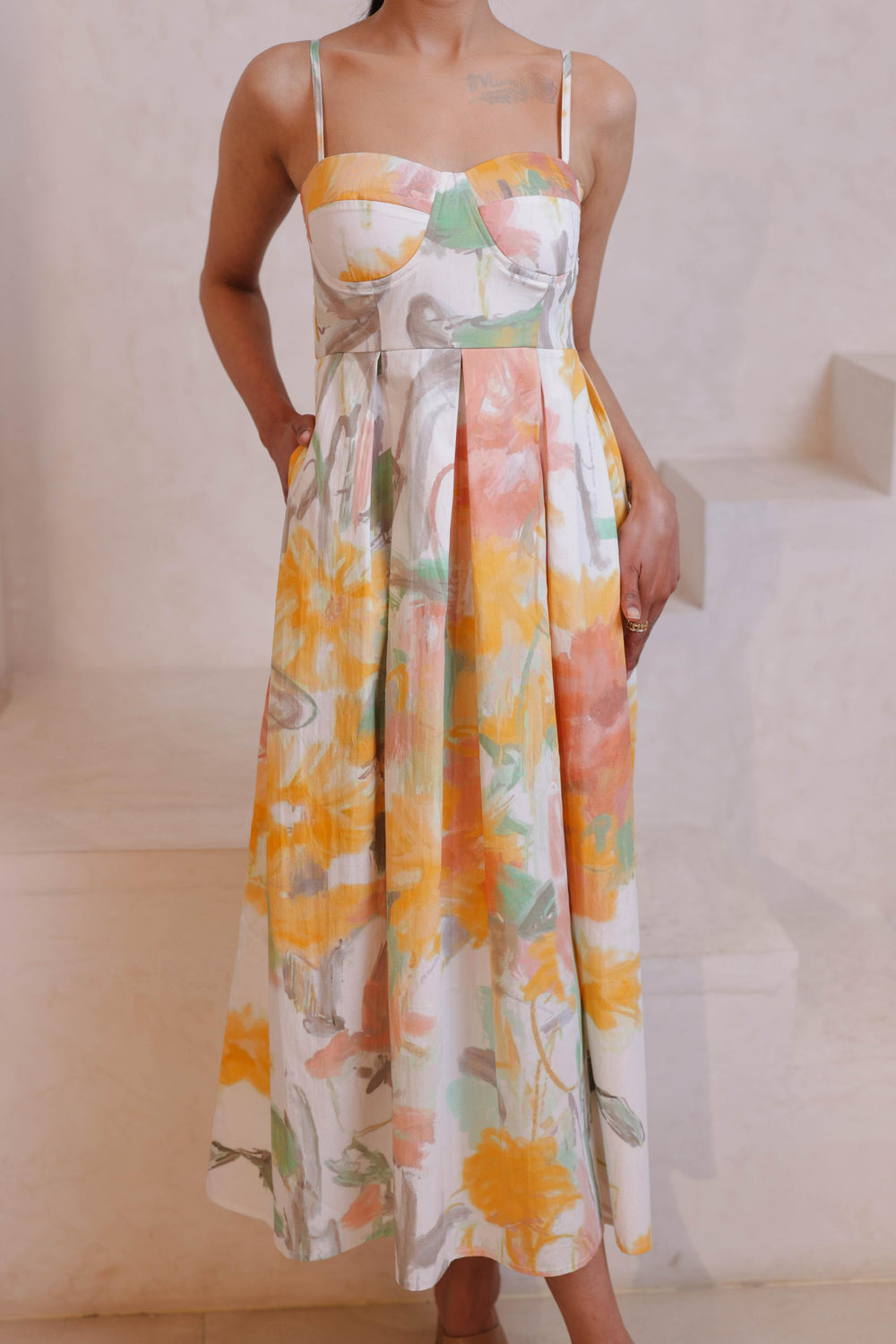 The Bahaar Padded Dress by Thr3letter, featuring a vibrant floral print and a comfortable silk-cotton mix.