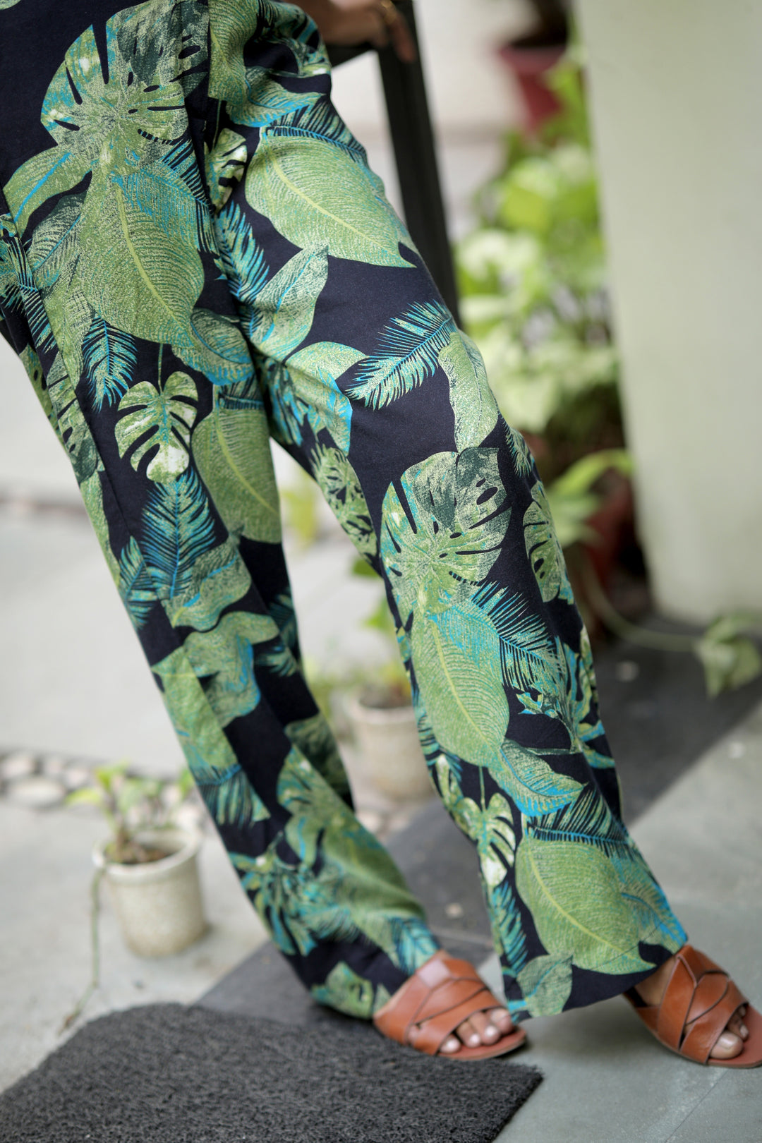 thr3letter presents Seher Pants: Contemporary resort wear in quality rayon-cotton blend with statement jungle leaf motif