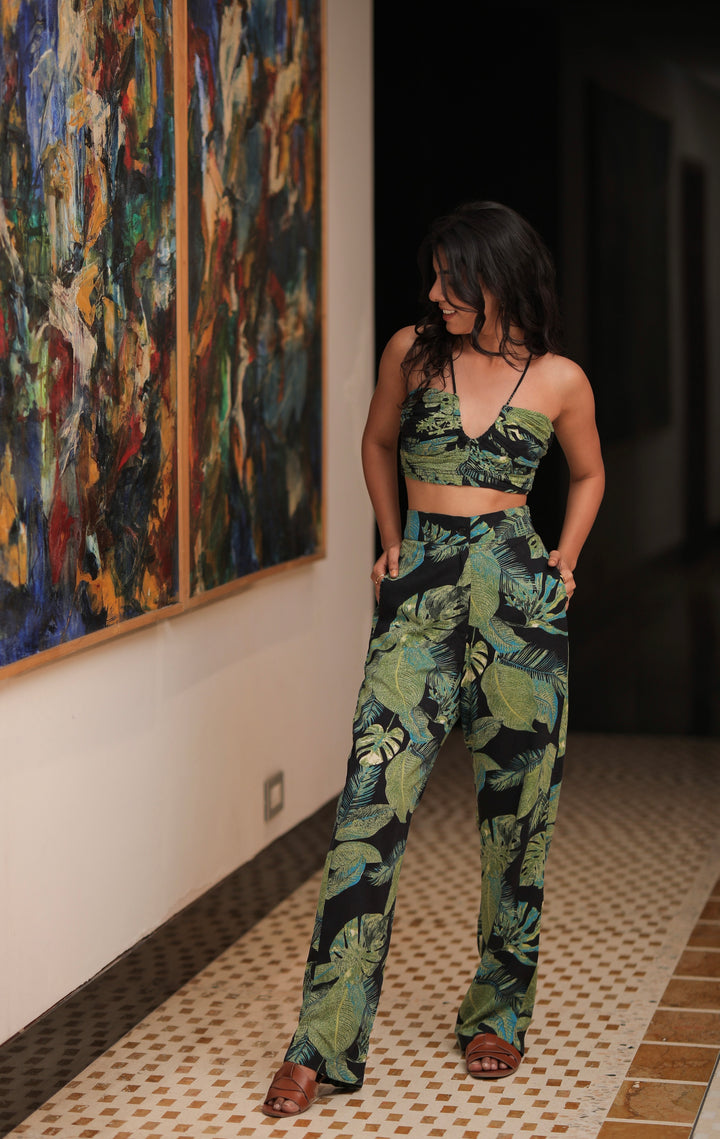 thr3letter Seher Pants in luxurious rayon-cotton blend, featuring bold tropical leaf print and relaxed wide-leg silhouette"